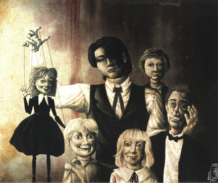 A man in formal attire surrounded by puppets propped up like a victorian family protrait