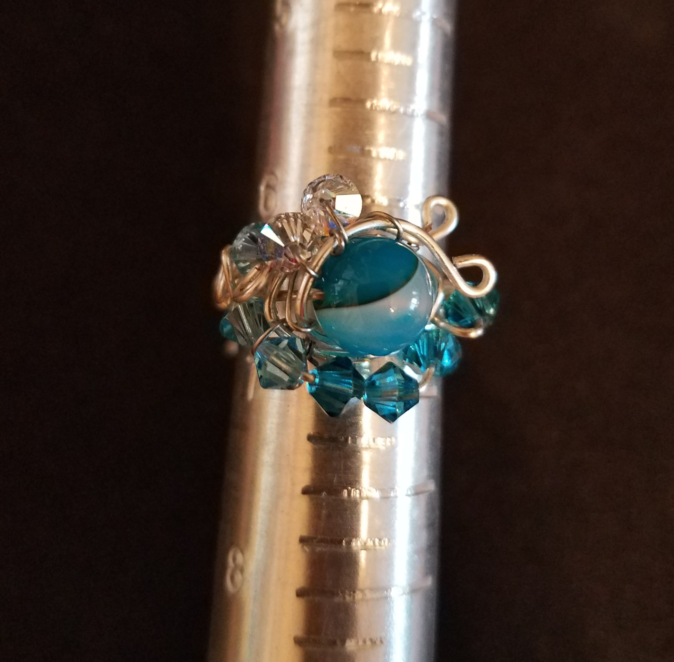 Blue stone ring in plated silver