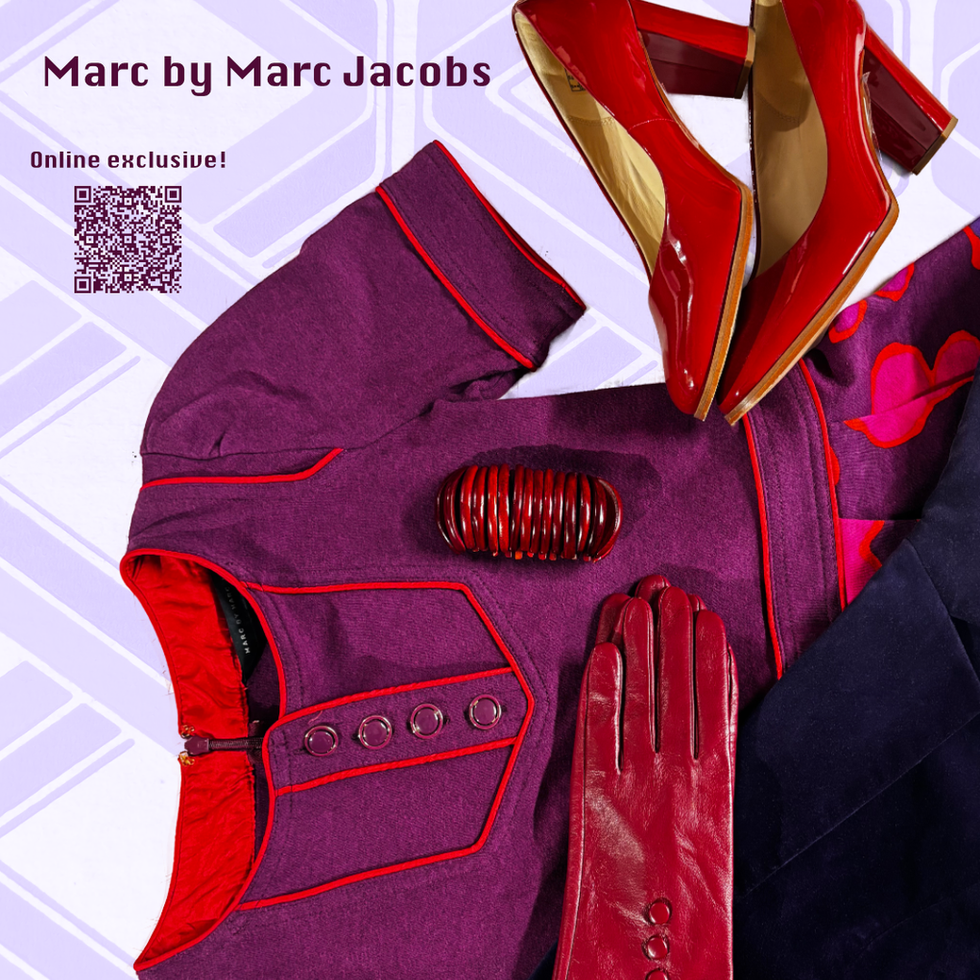 A warm purple dress with orange piping and floral pattern on the bottom. With a red bracelet, gloves and heels. A dark purple velvet jacket is draped at the bottom.