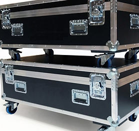 Two flight cases that are stacked up on each other