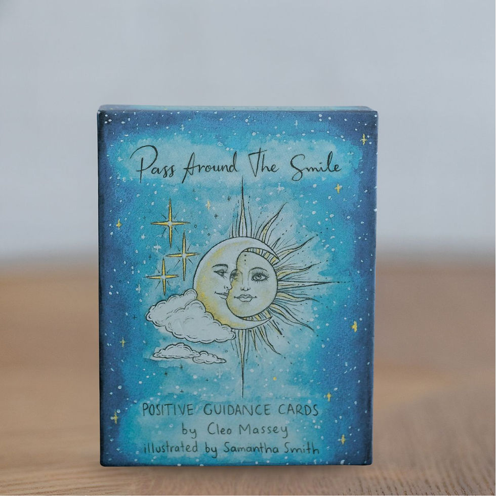 A box of Pass Around The Smile positive guidance cards featuring a sun and moon illustration on a blue background.