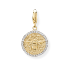 Recycled solid gold embossed bee pendant .small diamonds  set around the  edge.