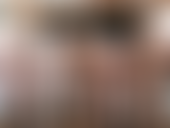 Nudists enjoy the fire.