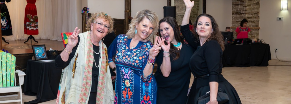 Four women posing at Gala