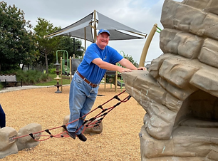 The Arc of Katy participant at the park