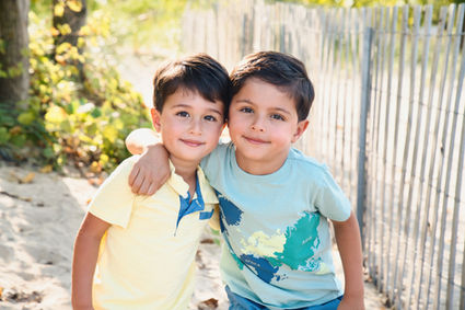 Brothers Hugging at beach