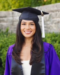 Individual portrait with cap and gown of Northwestern Graduate
