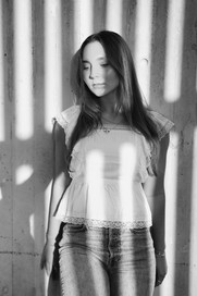 Black and White by wall at Gillson Beach  — senior graduate photographer Wilmette Chicago North Shore