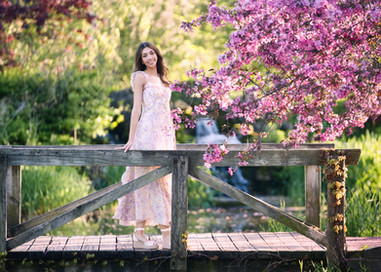 Senior graduate standing by pink blooms  at Keay Nature Center — senior graduate  photographer Wilmette Chicago North Shore