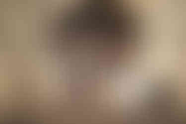 Northwestern University graduation friend group champagne celebration at campus arch — group graduation photographer Evanston Illinois