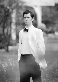 Senior male in tuxedo in  black and white photo  at Mallinckrodt Community Park — graduation photographer Wilmette Chicago North Shore