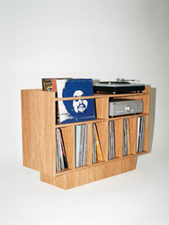 Groove No.3 turntable stand by Groove Wood Studio in birch plywood with a light oak finish, featuring front vinyl record slots and space for audio components.