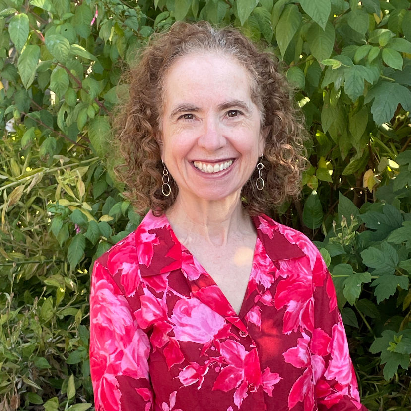Portrait of Barbra Silver standing outdoors