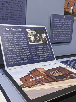 Detail shot of Turner Station interactive board, where visitors can lift the board to learn more about the Anthony Theater in Turner Station.