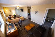 Living room in our VRBO above the Cedar Lounge Taproom