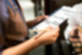 waitress-writing-a-food-order-531292661_