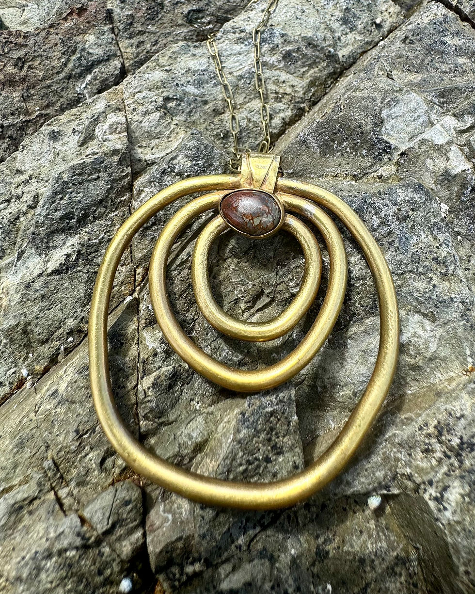 Thumbnail: Gem Dinosaur Bone Orbit Necklace 
