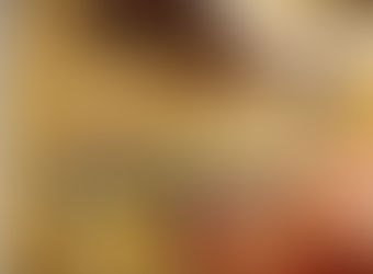 Close-up of stained glass with uneven solder seam on copper foil.