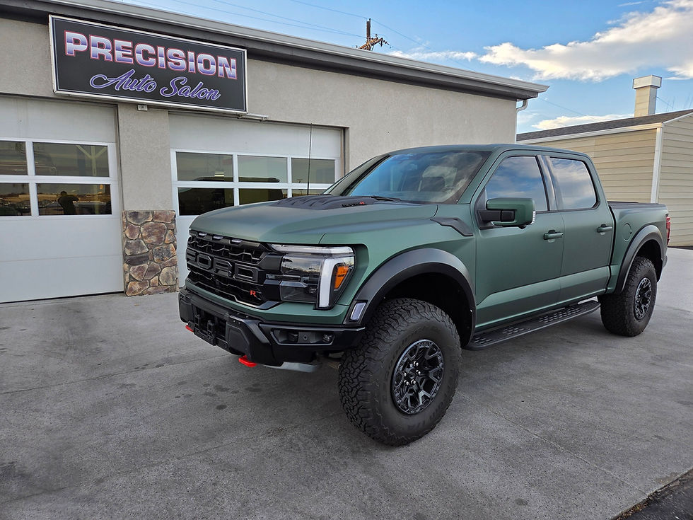 The green ford raptor r recived a full 3m vinyl color change wrap 3