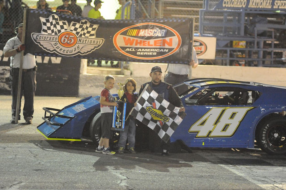 Eddie Vecchiarelli in winner's circle (Starr photo)