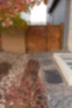 Extended Concrete Patio With Added Flagstone Patio & Brick Planter