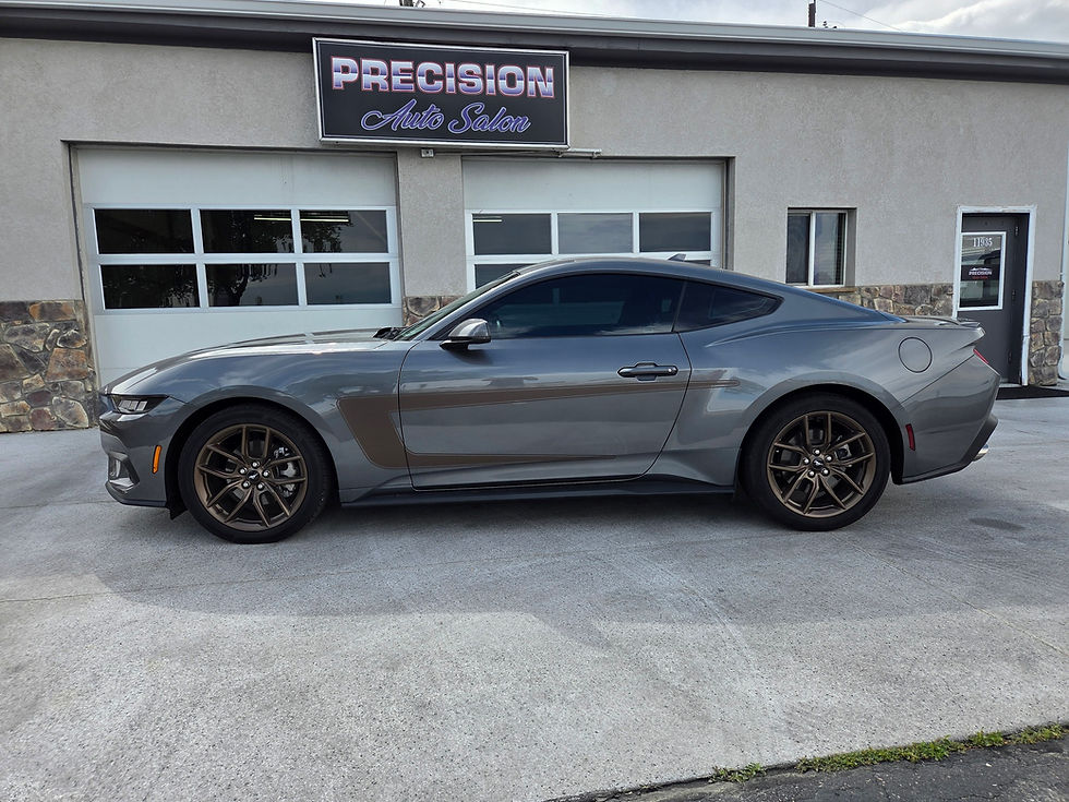 The Ford Mustang  received custom vinyl decals to match the factory bronze package