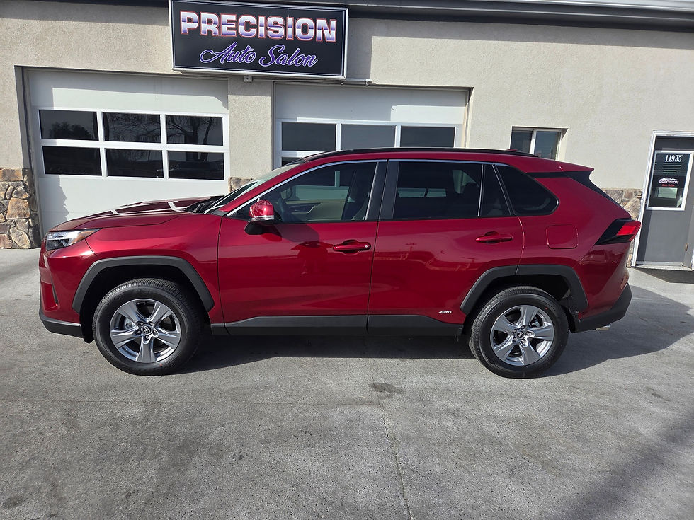 The red toyota rav 4 recived a 2 window match and front end clear bra