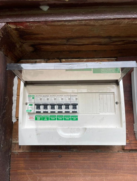 view of a modern consumer unit with circuit breakers.
