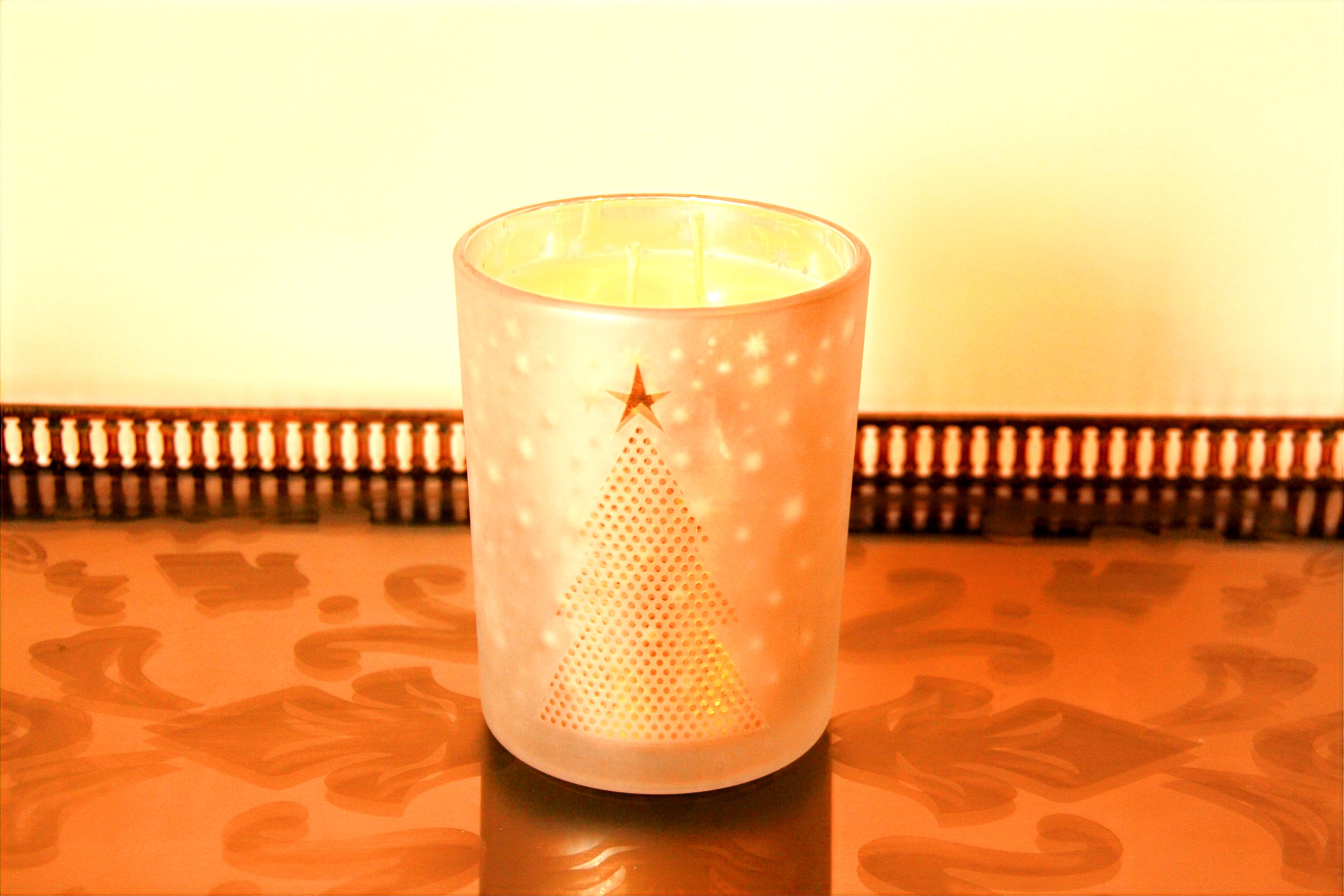Stunning silver christmas eve design candle on antique bronze tray