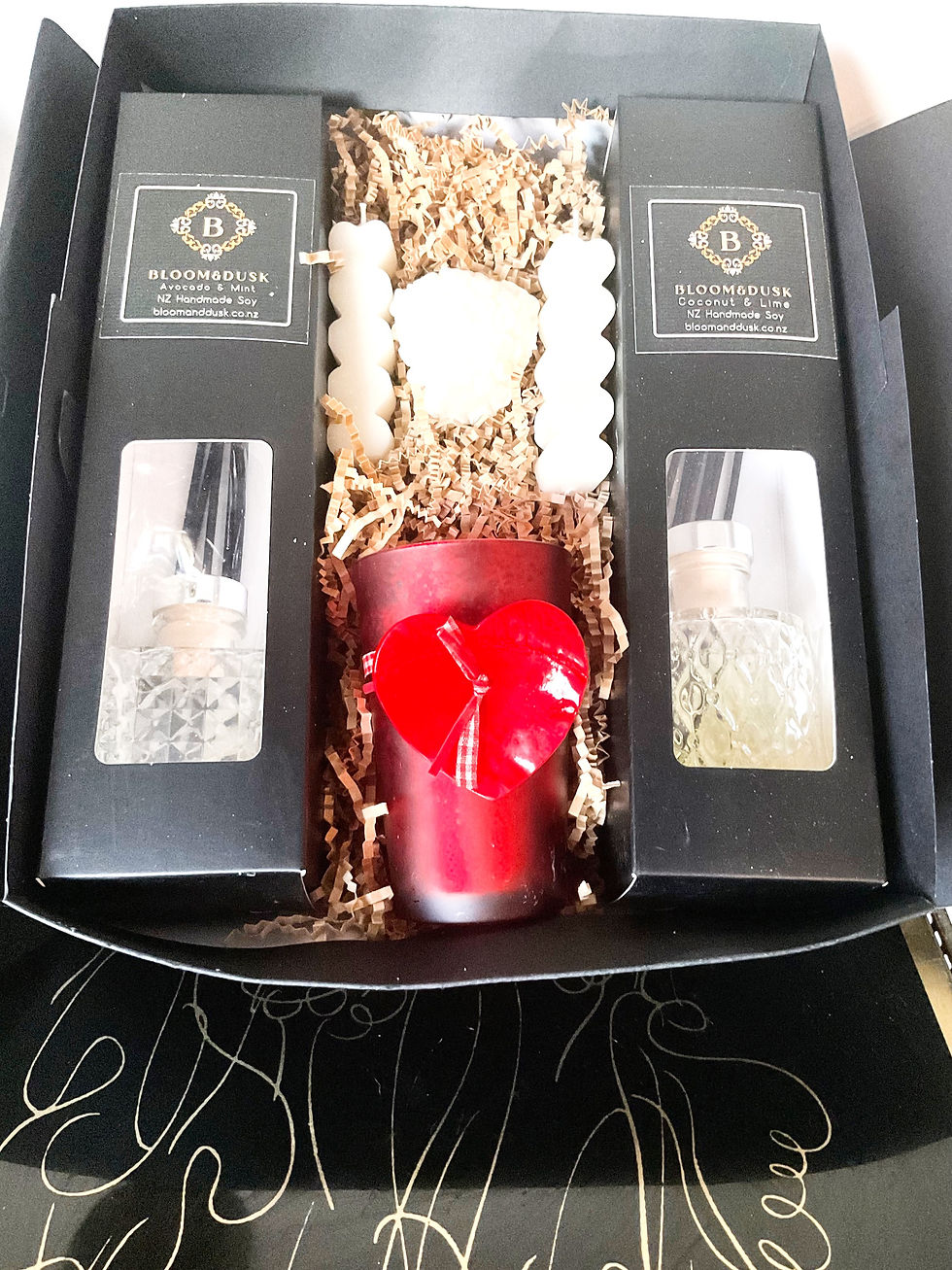 Deluxe candle gift box with red candle, two diffusers and a heart shaped candle