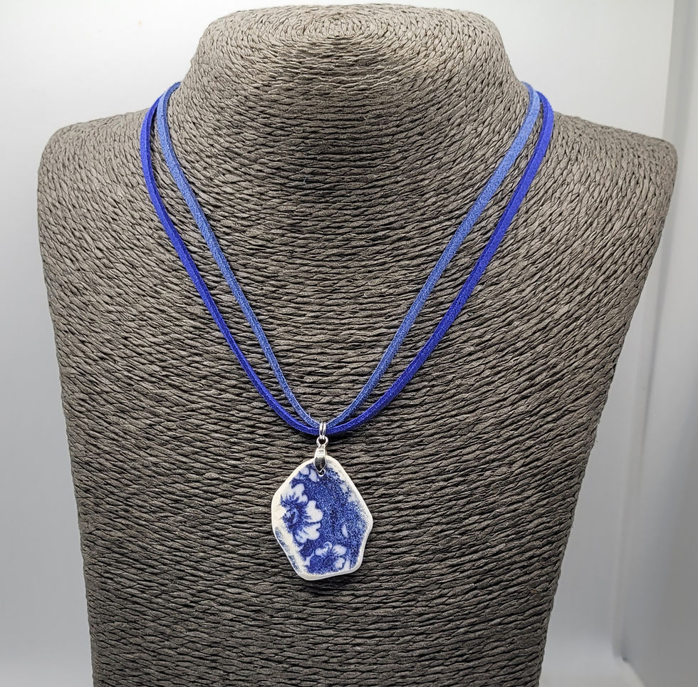 Thumbnail: Blue sea pottery necklace on display bust