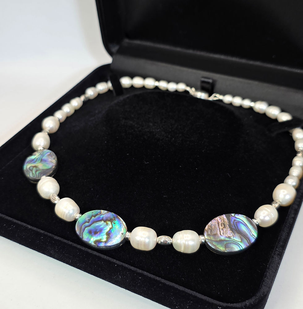 Thumbnail: Large cultured pearl and Abalone necklace, displayed in black luxury necklace box