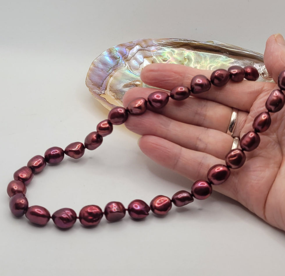 Red freshwater cultured pearls with sterling silver clasp