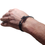 Thumbnail: Mens cord bracelet with black tourmaline and larvakite, displayed on wrist