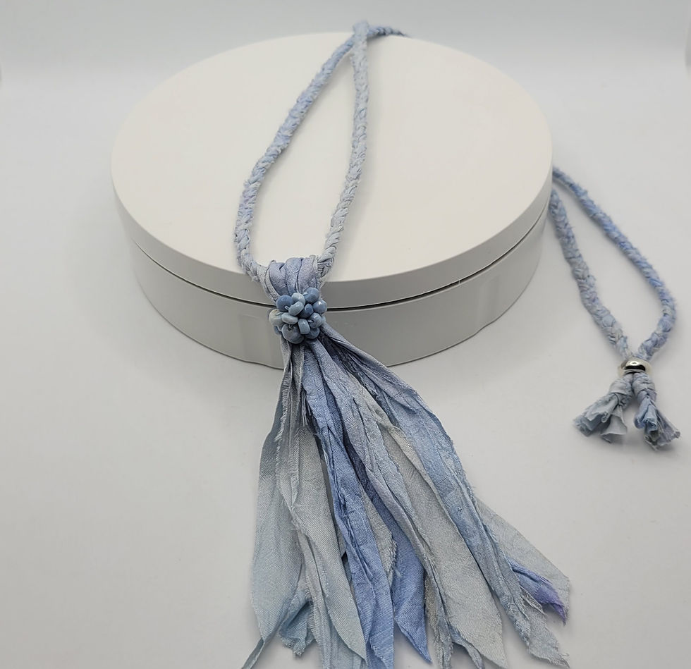 Thumbnail: Blue plaited sari silk necklace with tassel