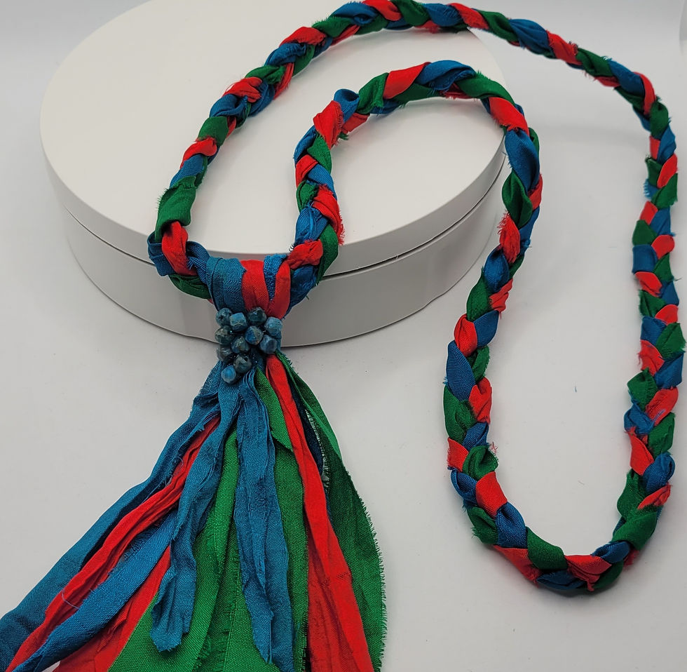 Thumbnail: Sari silk necklace in red green and blue with tassel