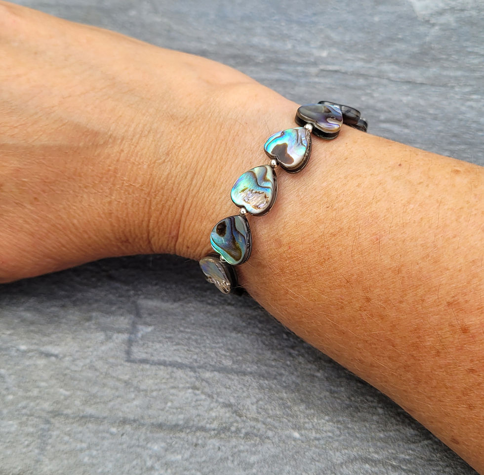 Thumbnail: Abalone heart bead bracelet on wrist