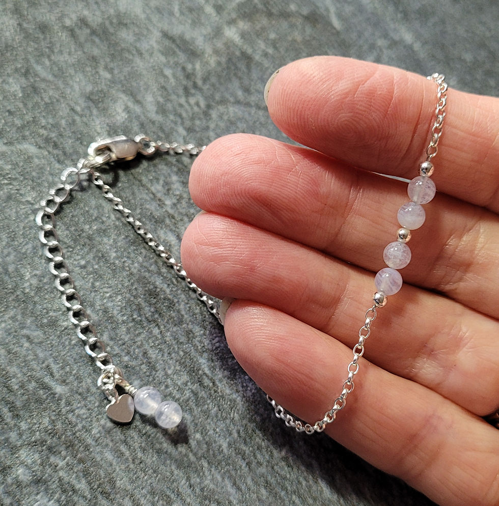 Thumbnail: Blue lace agate and sterling silver ankle bracelet, displayed in hand