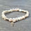 Thumbnail: Keshi cultured pearl bracelet with sterling silver angel wing charm