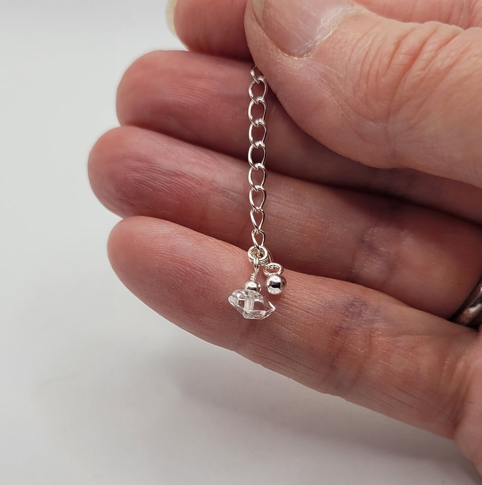 Thumbnail: Herkimer diamond and sterling silver ankle bracelet, displayed in hand