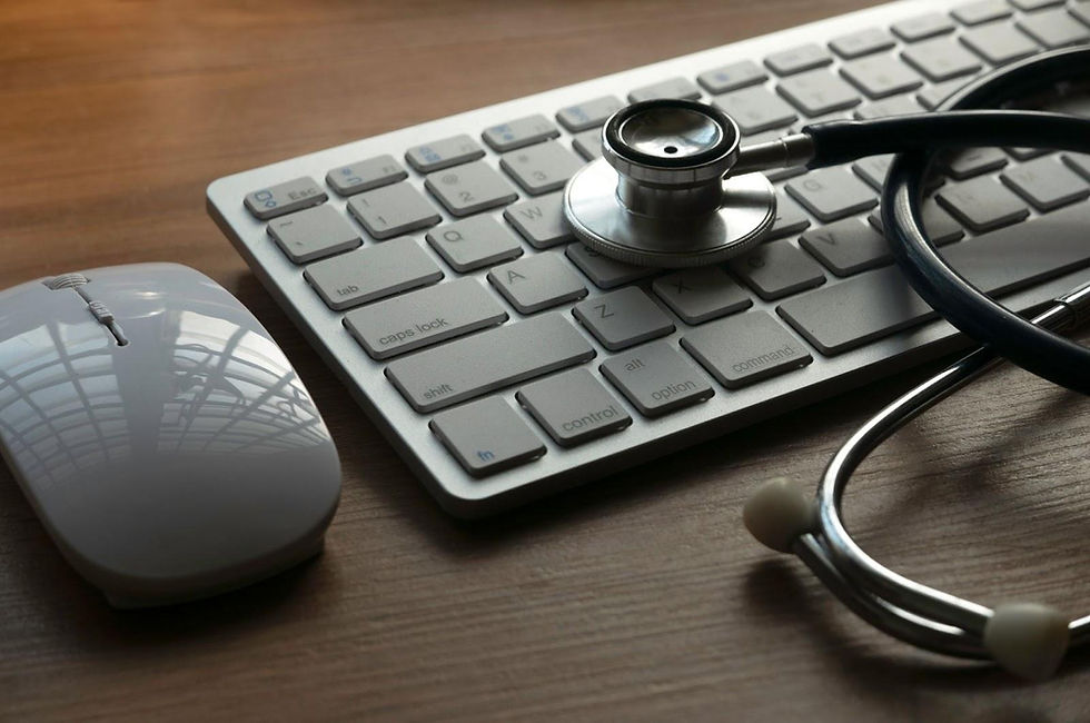 Stethoscope on computer keyboard symbolizing telemedicine technology and compliance.
