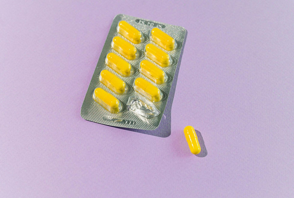 yellow medications on purple background