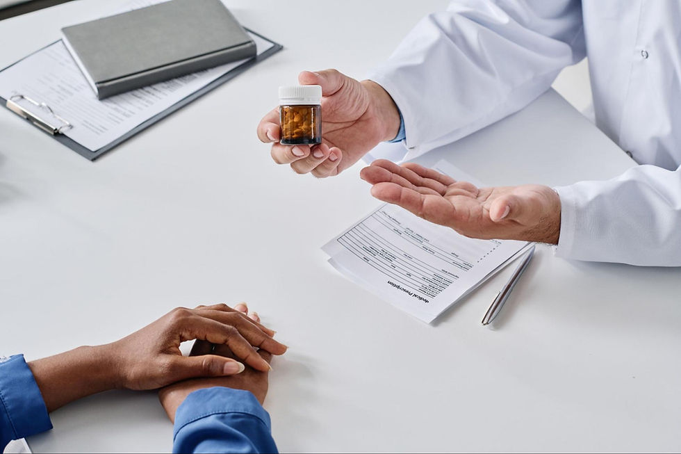 Doctor explaining medication to patient as part of physician dispensing solutions.