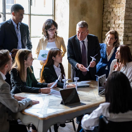 Community leaders and justice advocates discussing strategies for funding and sustaining local justice programs