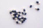 white and blue capsules