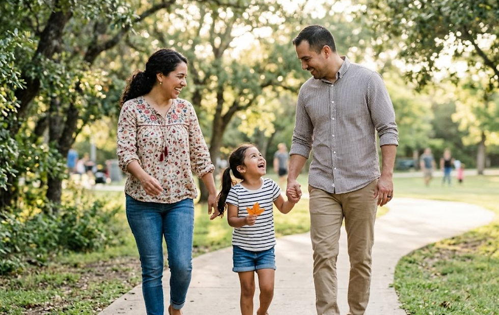 Smiling family at the park celebrating how does owner financing work in Texas to help families achieve land ownership.