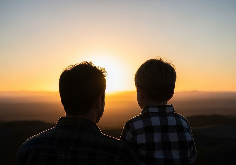father and son looking at land, setting sun