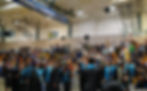 Yaaḵoosgé Daakahídi High School graduates throw their caps on Sunday, May 24, 2026. (Jasz Garrett / Juneau Independent)