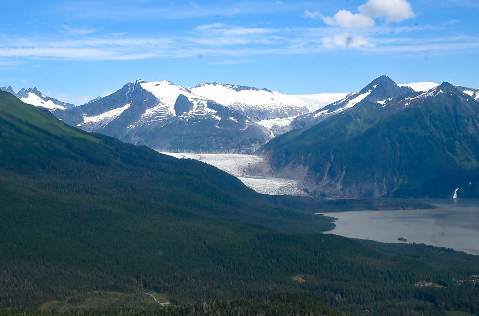 Suicide Glacier is seen hanging above the Mendenhall Glacier in this photo taken from a helicopter on Aug. 13, 2025. (Jasz Garrett / Juneau Independent)