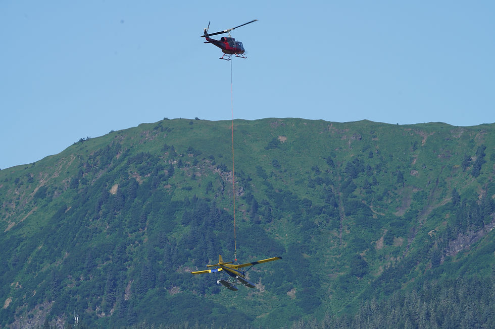 A photo taken at 4:11 p.m. on Thursday, Aug. 13, 2026 shows the floatplane being transported back to the Juneau International Airport. (Photo courtesy of Robert Doremus)
